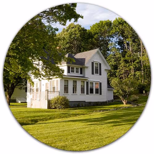 exterior of nice home with lawn - Homeowners Insurance concept
