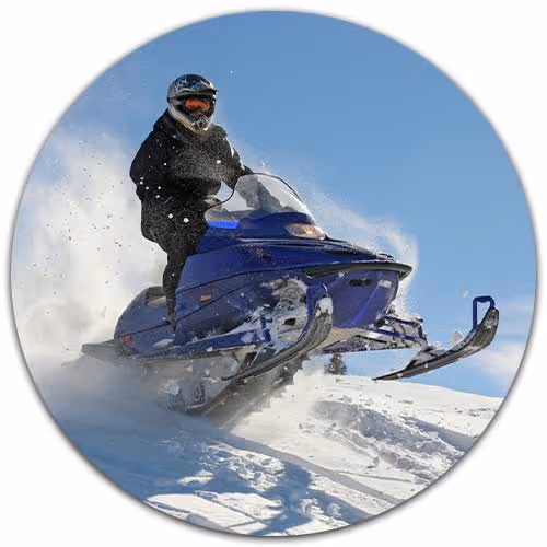 rider on snowmobile in winter - Snowmobile Insurance concept