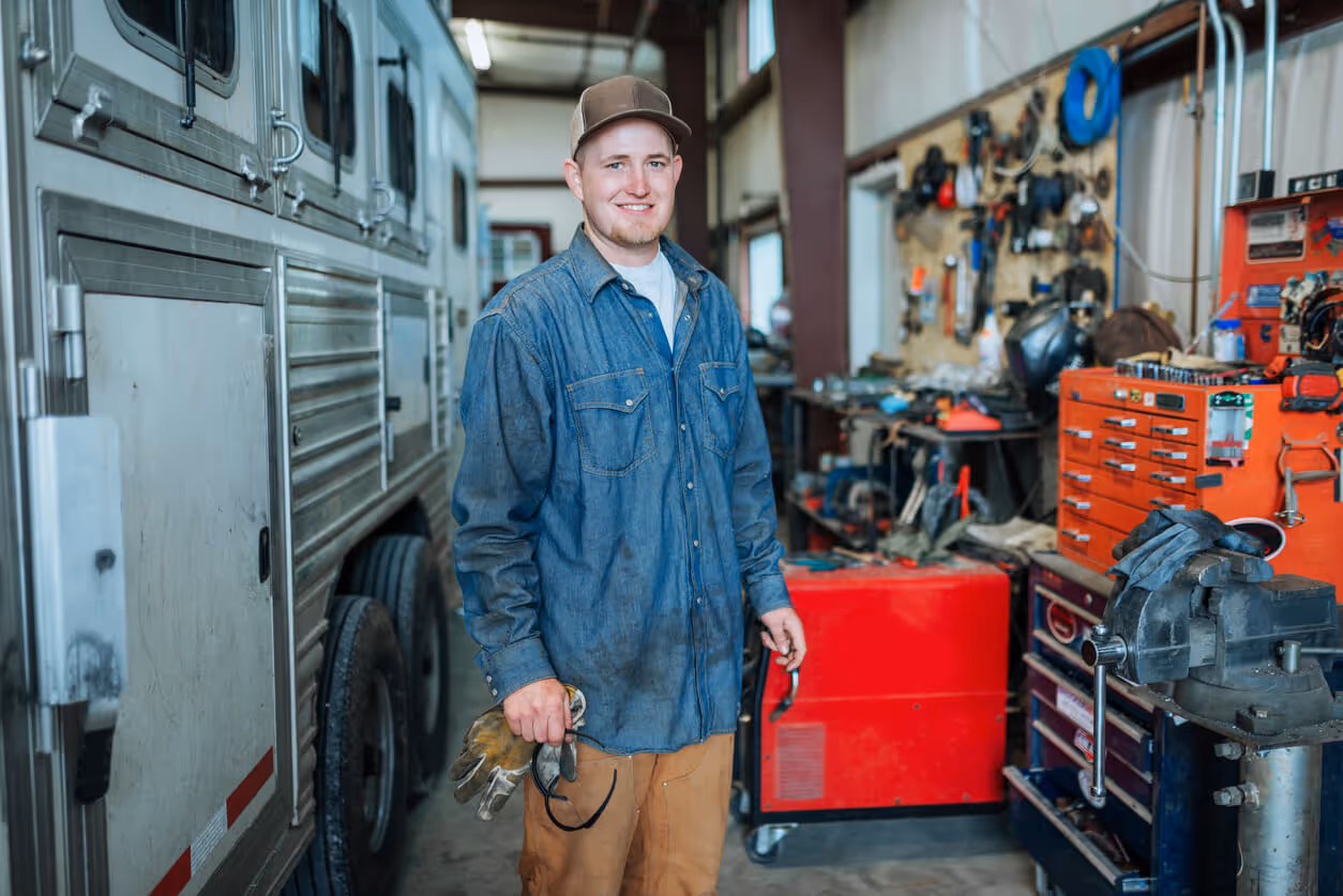 NH Garage Keepers Insurance concept - Skilled blue collar worker in the garage