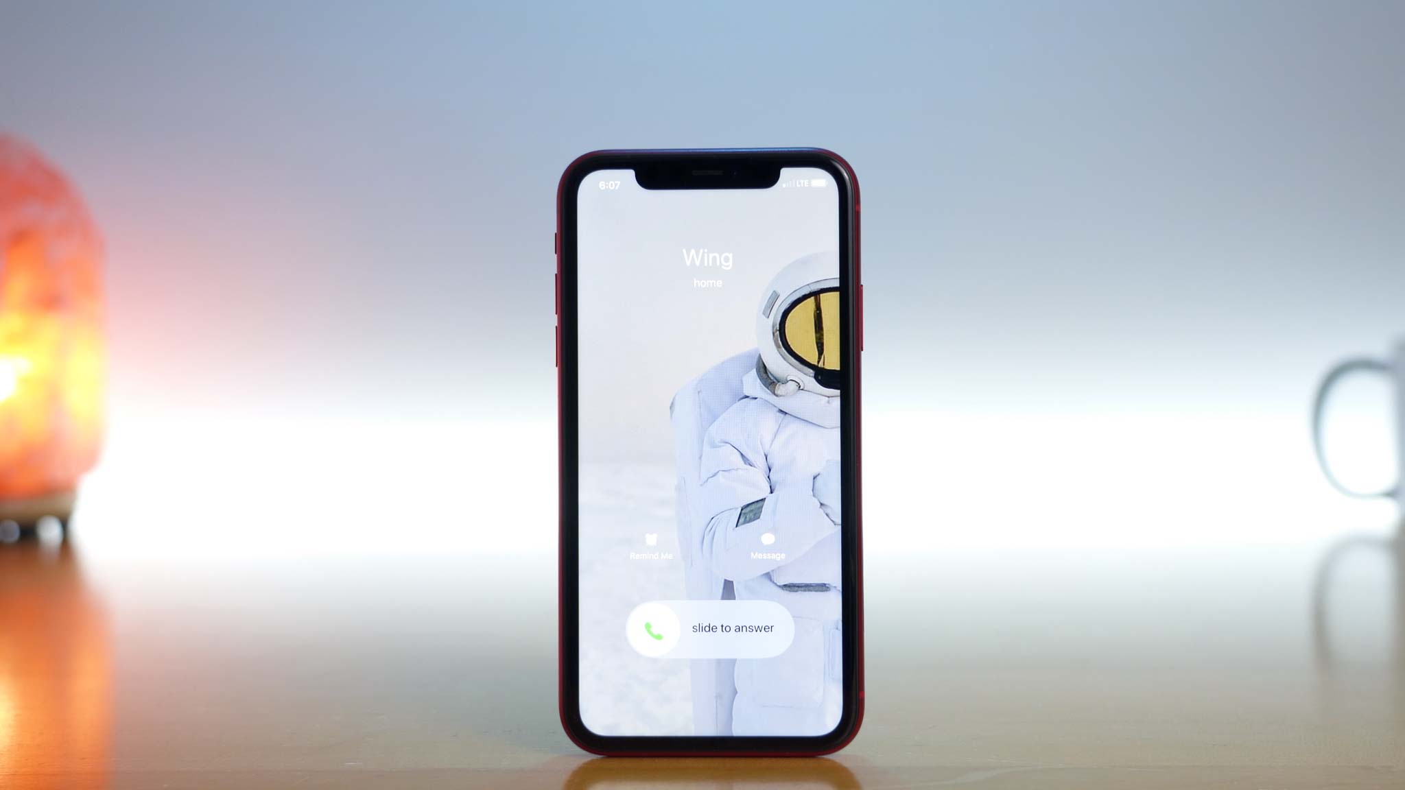 photo of iPhone 11 Pro receiving a call from contact named Wing with an astronaut profile picture