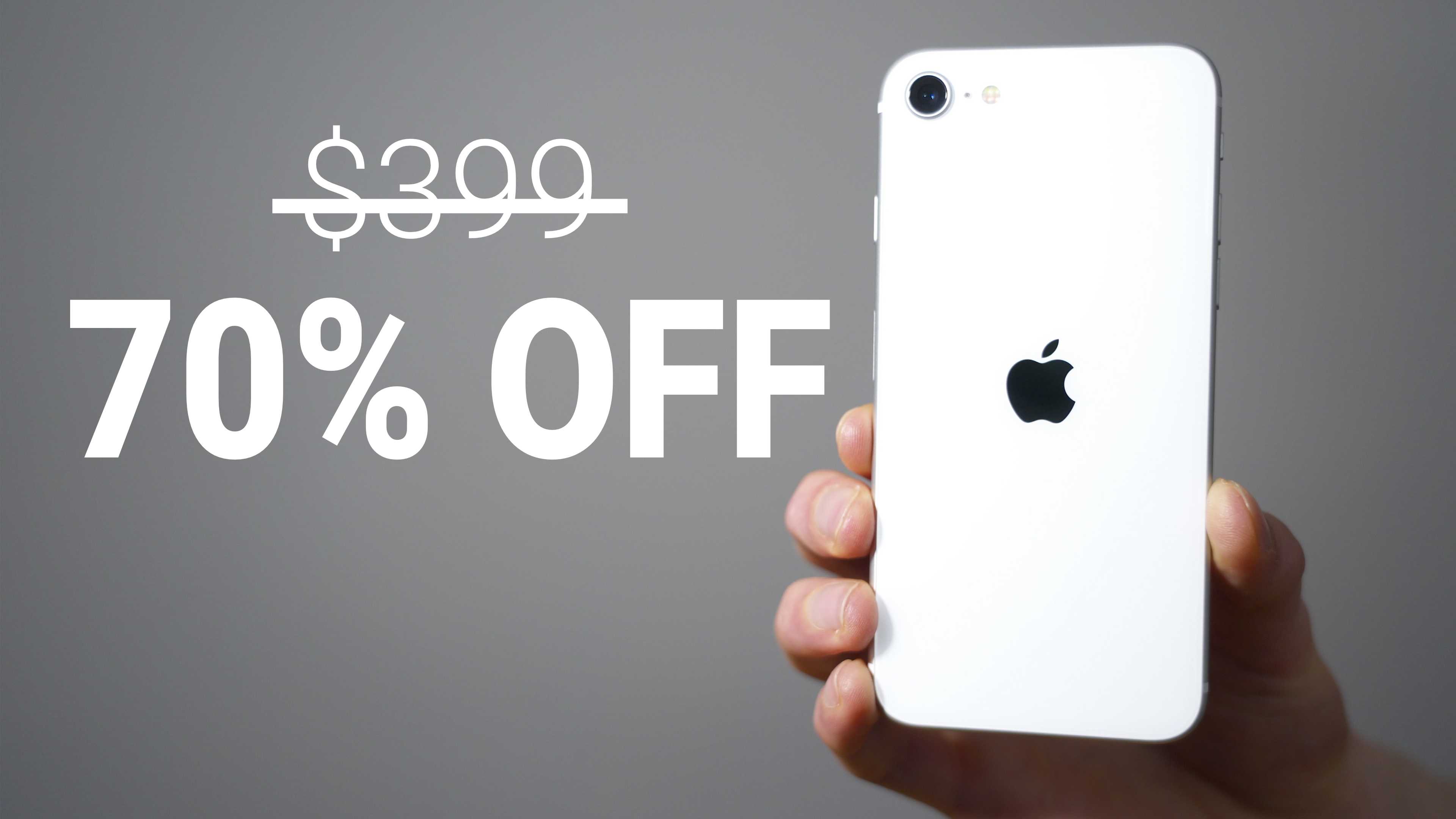 hand holding white iPhone SE 2020