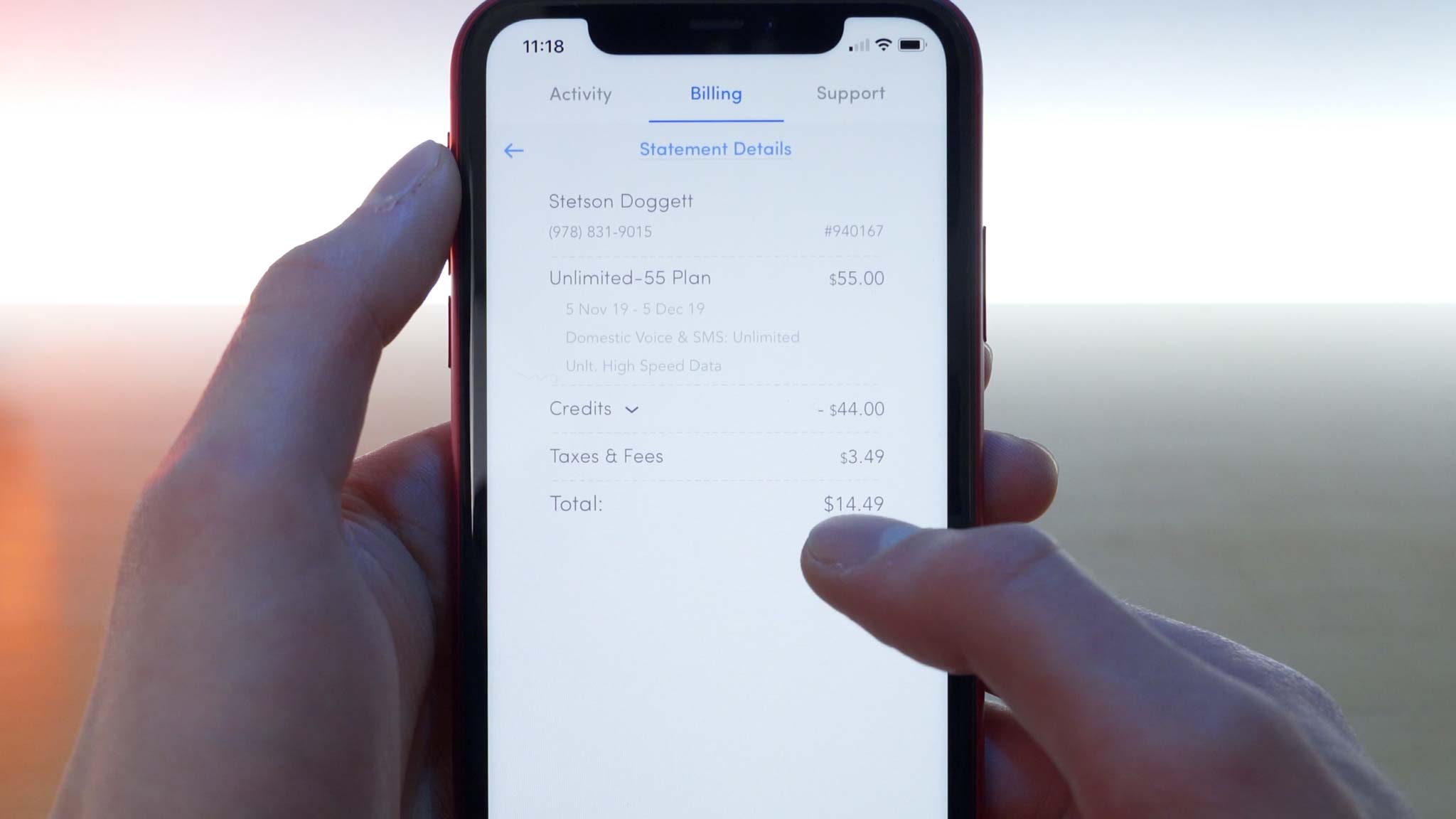 iPhone 11 Pro open to Wing application showing $44 credit received and second month bill was $14.49