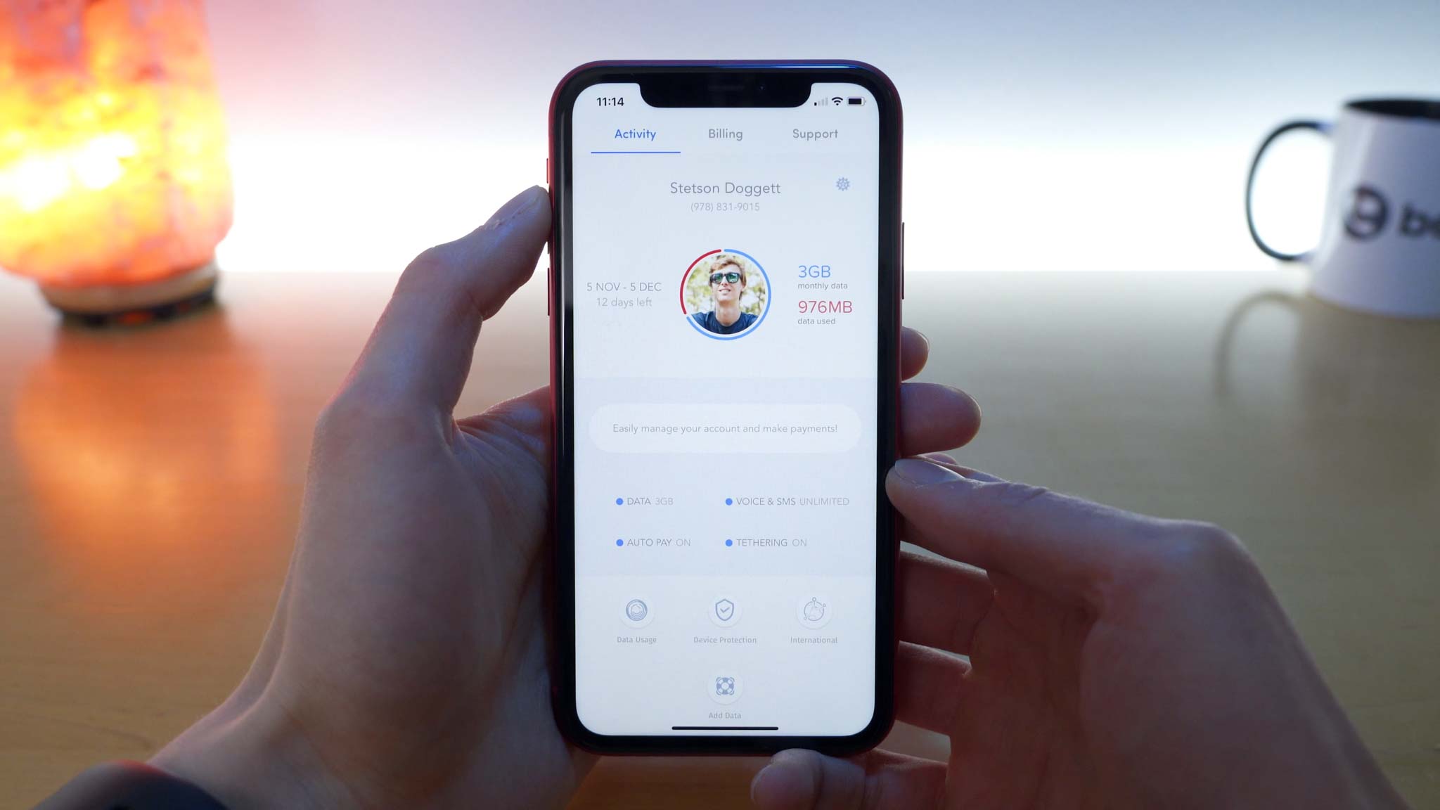 iPhone 11 Pro open to Wing application with overview of account and data usage