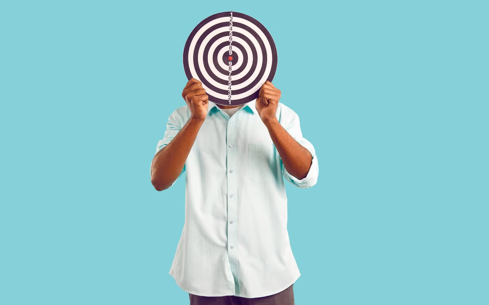 Image of a man holding a target.