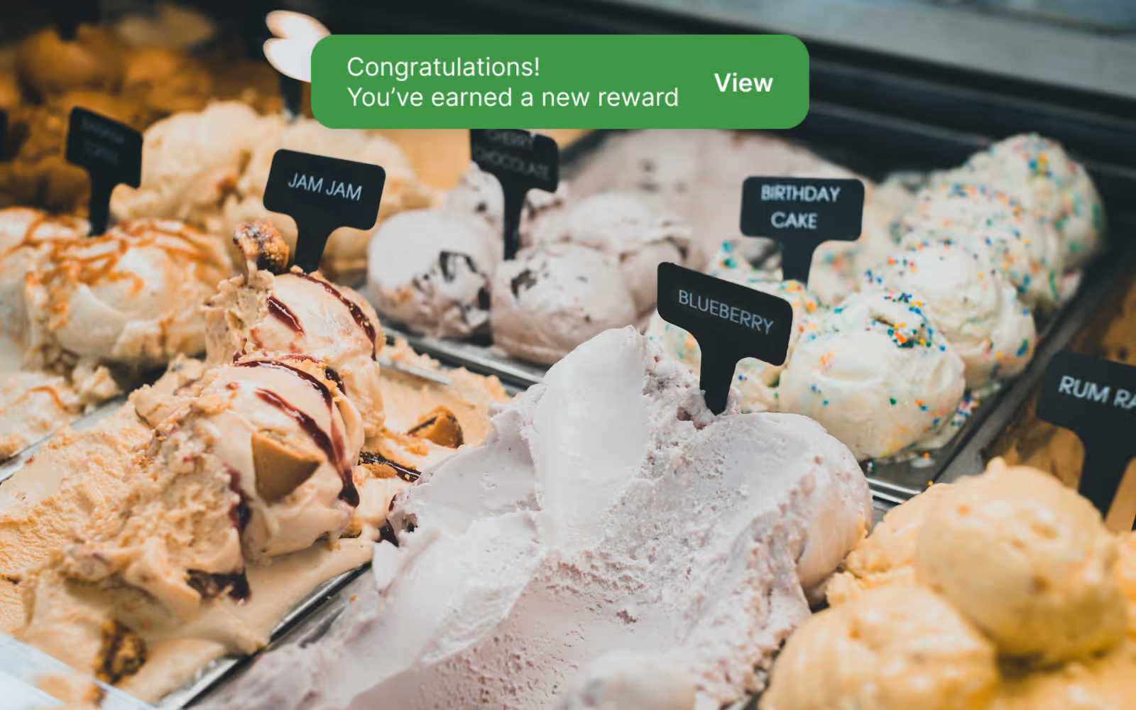 a person earning a reward from their digital loyalty program with a US ice cream shop