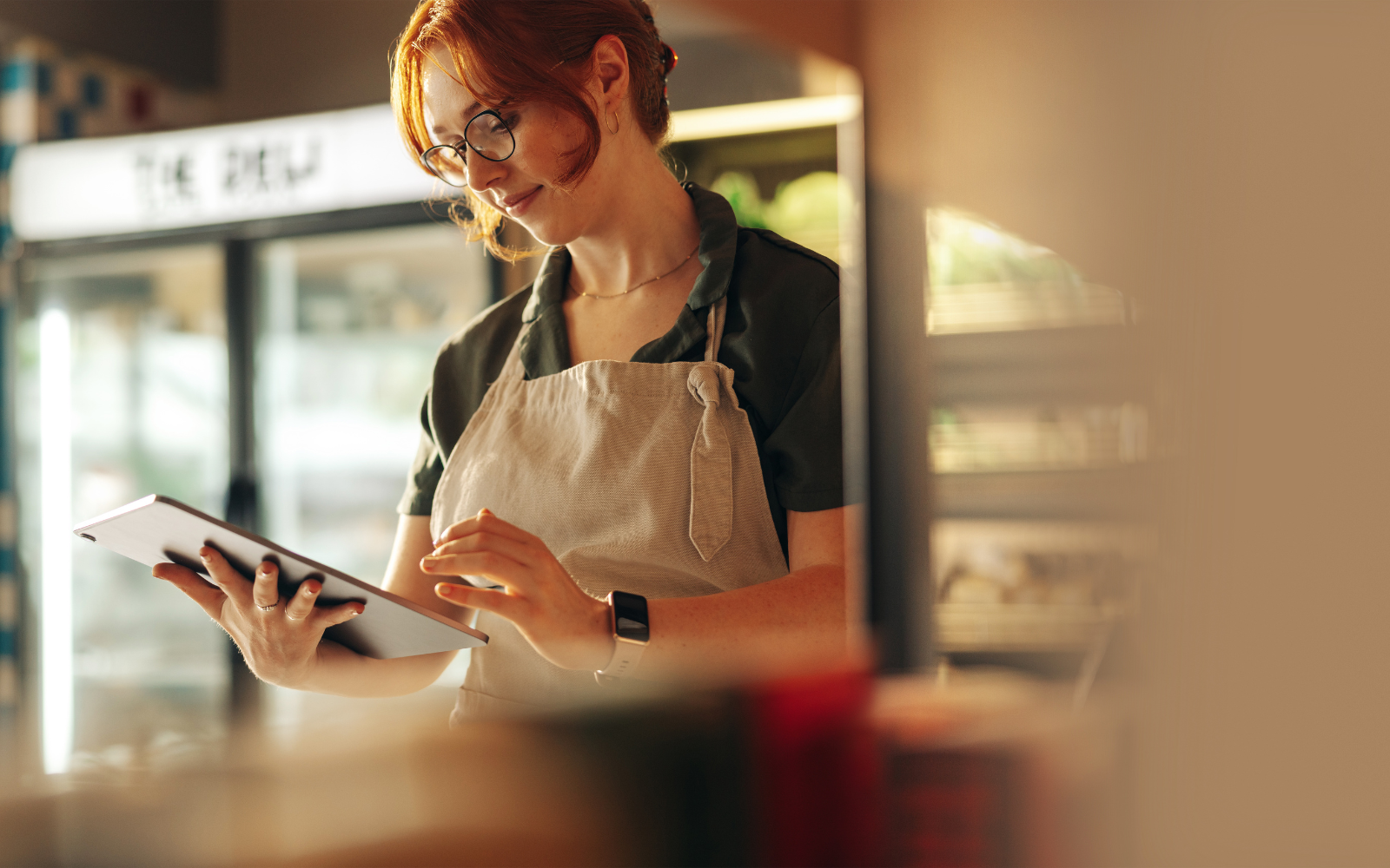 cafe owner using digital loyalty program