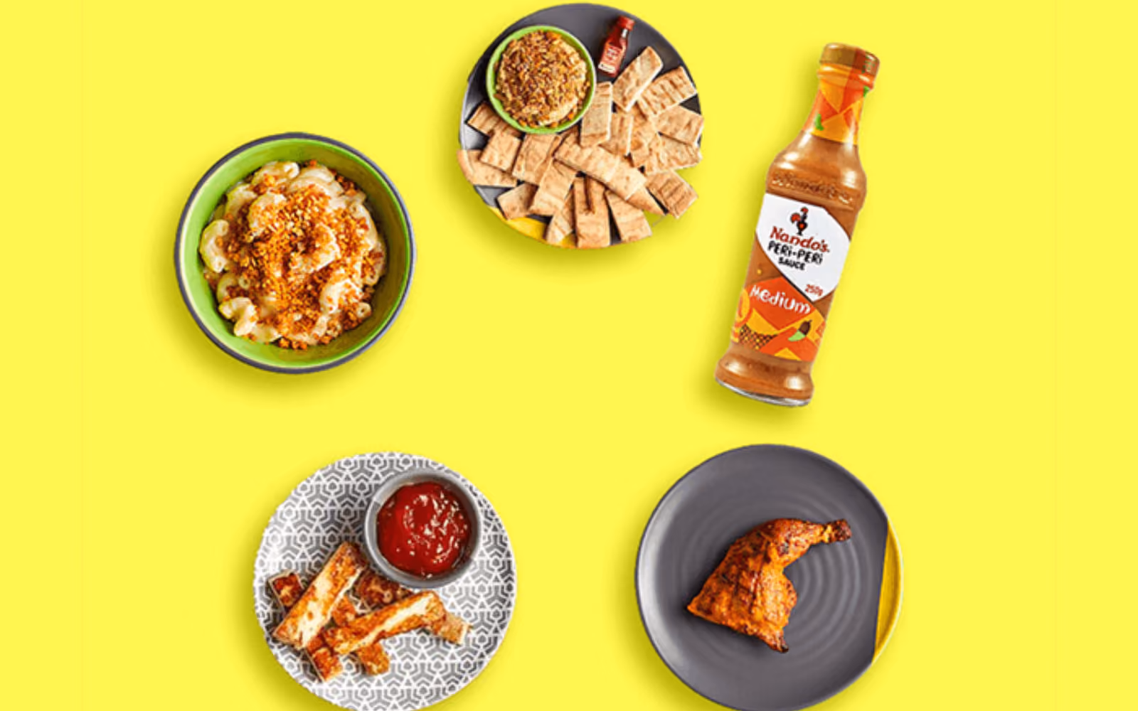 Customers using the Nando's PERi-Perks loyalty program through the Nando's mobile app at a restaurant location.
