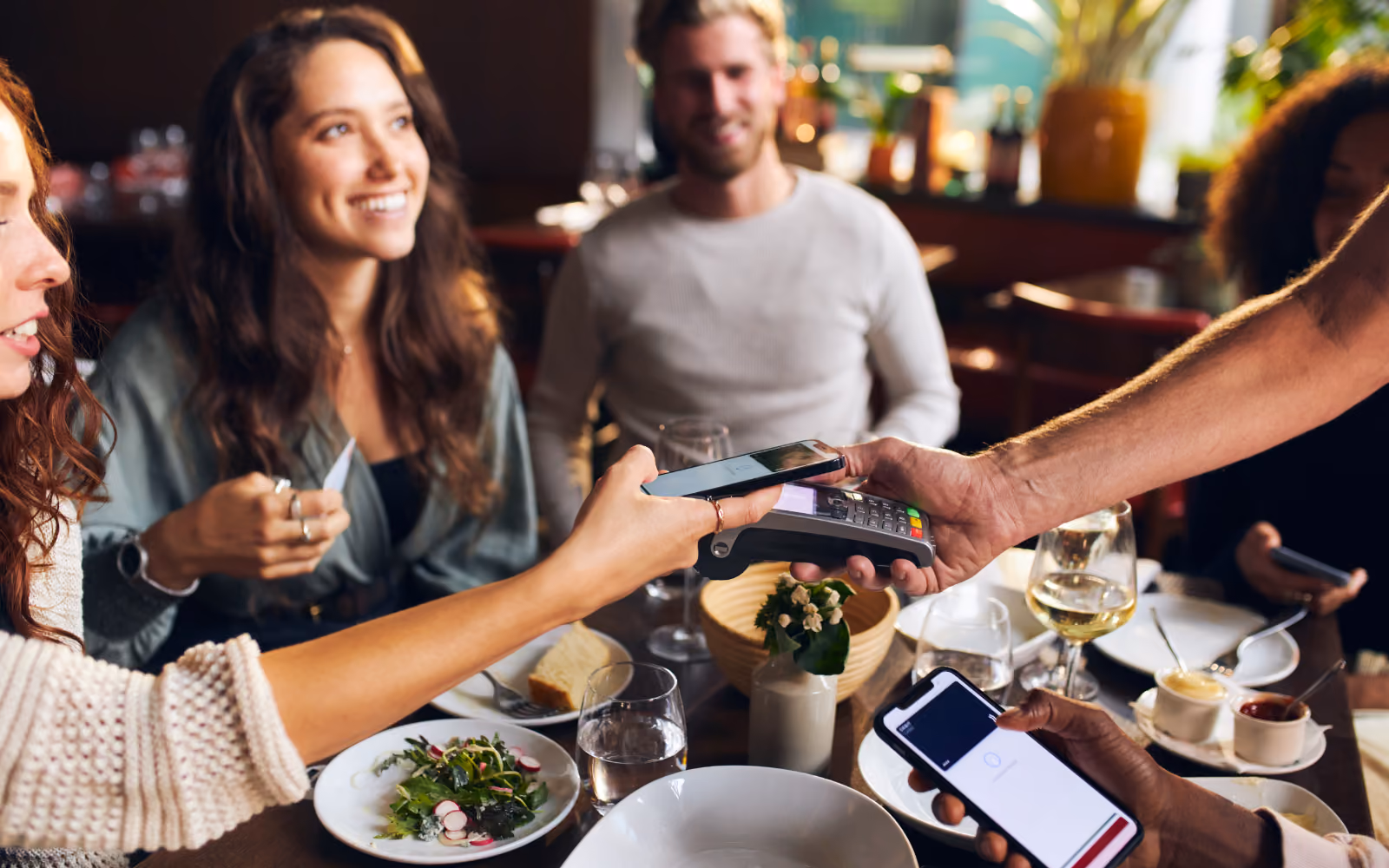 How to get repeat customers after restaurant opening — digital loyalty program sign-up at table