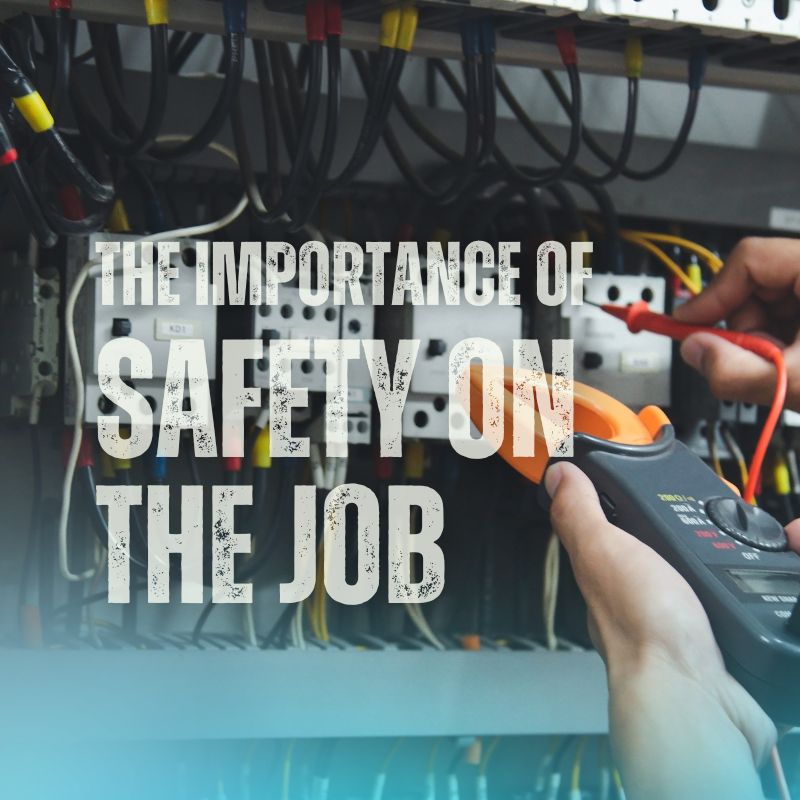 a worker handling an electrical panel
