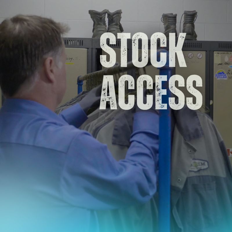 organizing a rack of employee uniforms