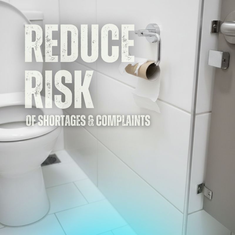 an image of a clean washroom stall, with an empty roll of toilet paper.