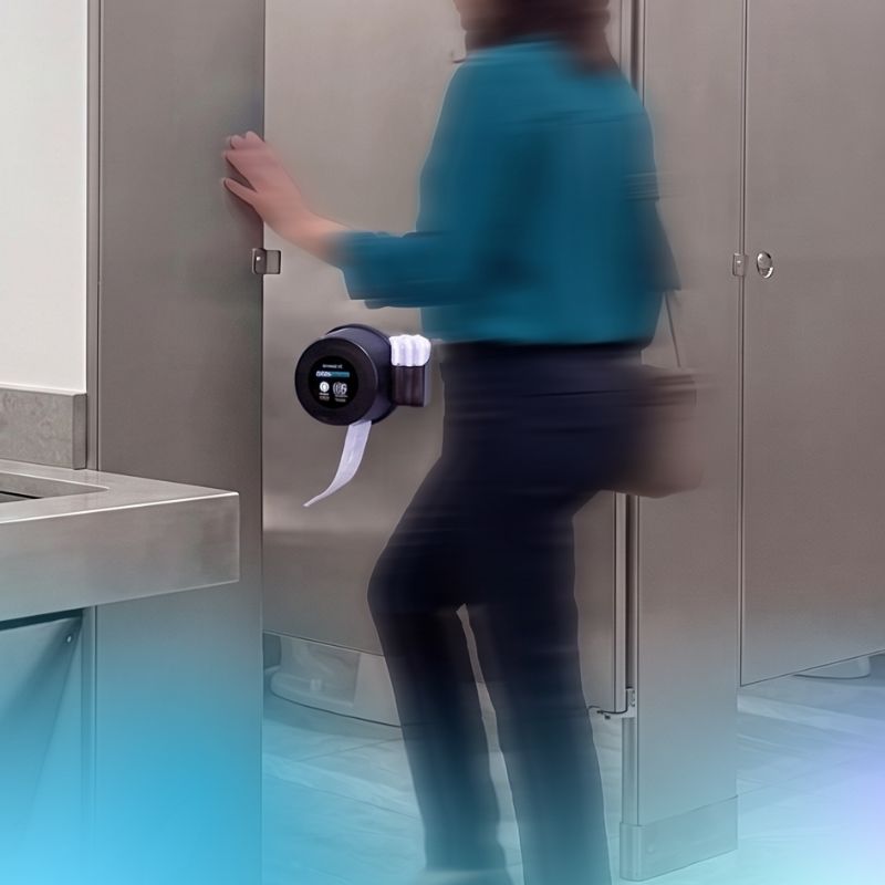 woman going into a washroom stall