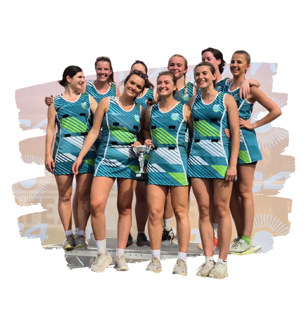 Photo of the Scrappy Netball team posing with a trophy.