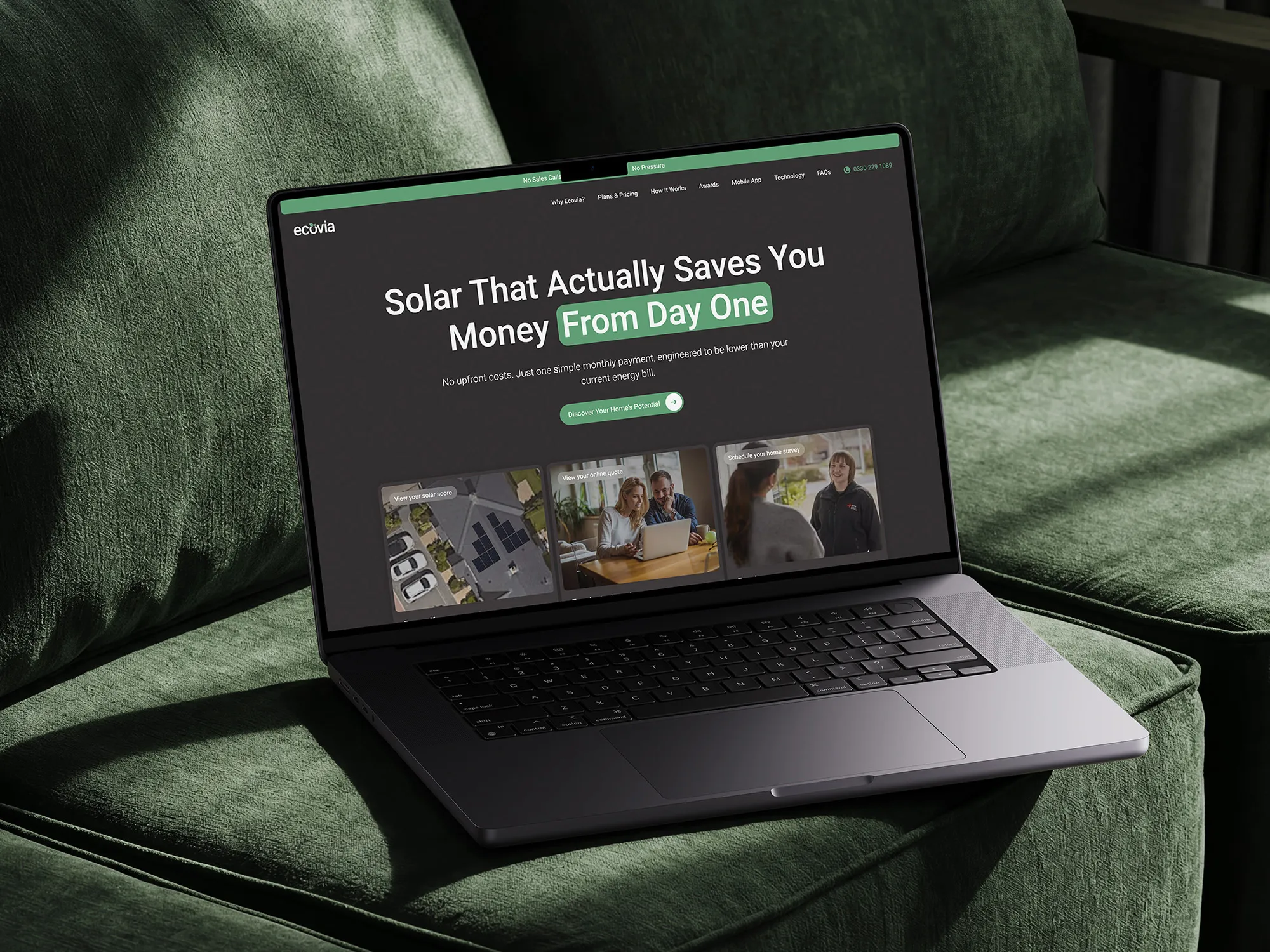 Ecovia solar energy website design displayed on a laptop on a green velvet sofa.