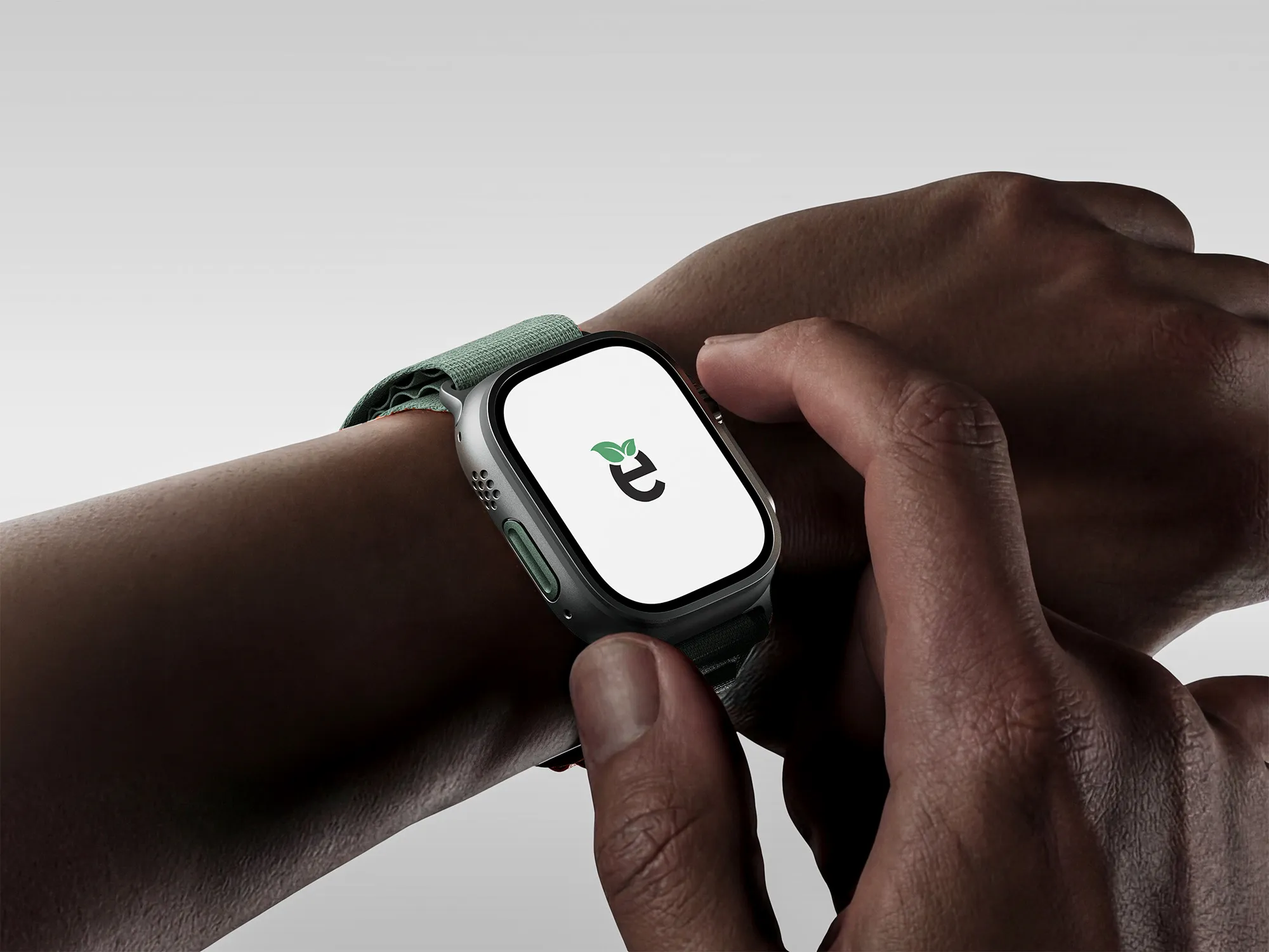 Ecovia clean-energy app icon displayed on an Apple Watch being used by a person.