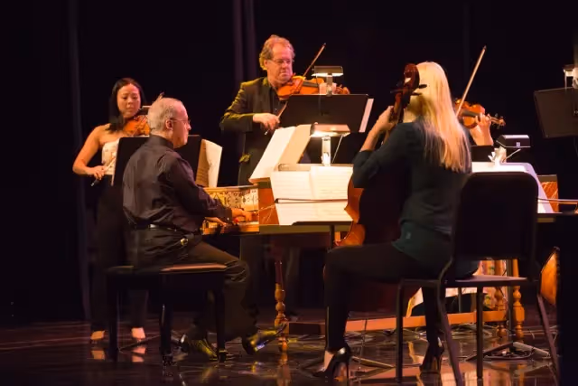 Conducting from the harpsichord