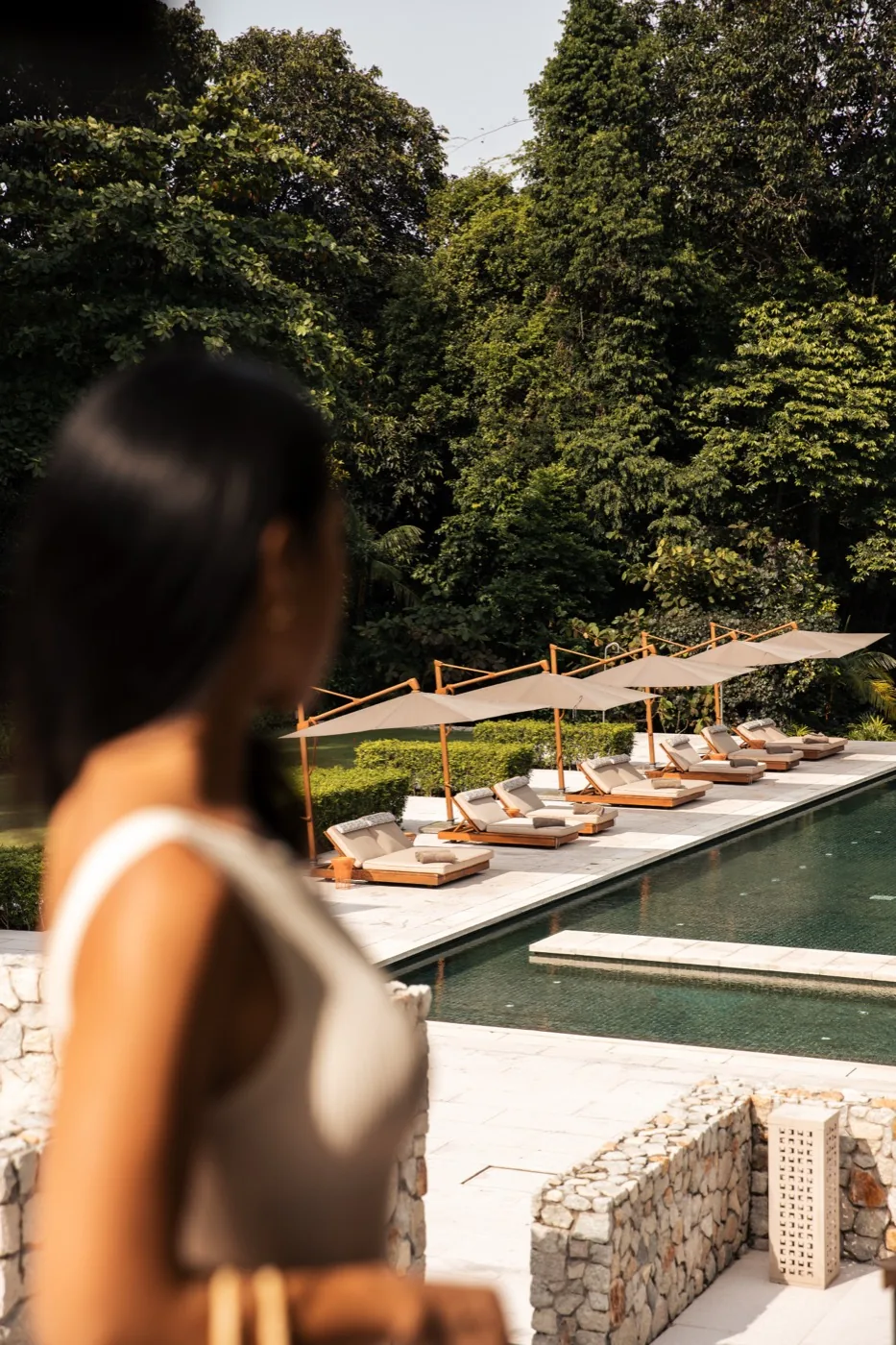 Guest looking over the pool at One&Only