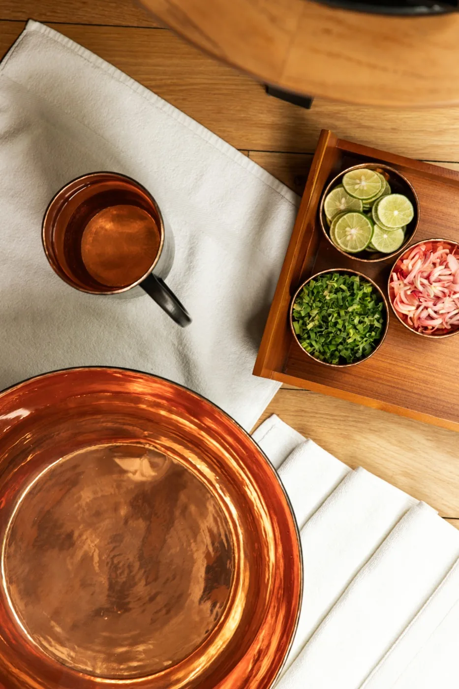Copper table setting with condiments at One&Only