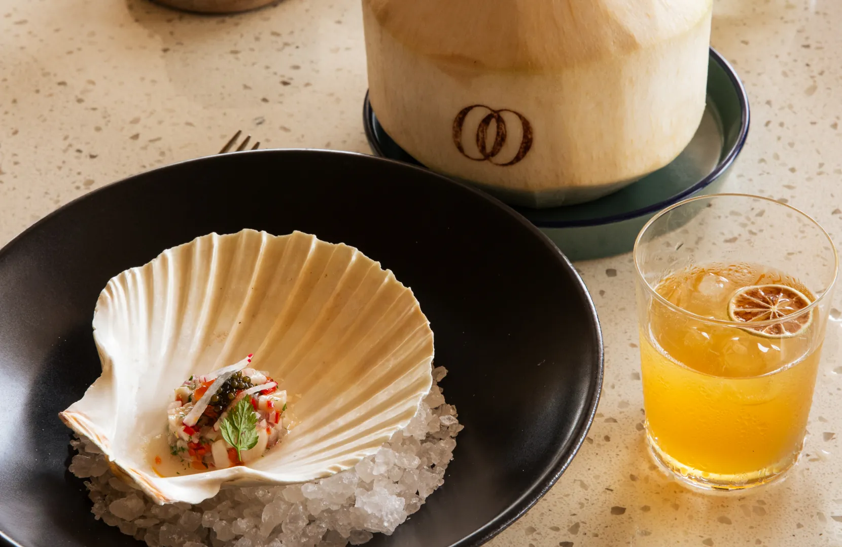 Rotating hotel photography: plated dish, resort pool, branded fan and grill