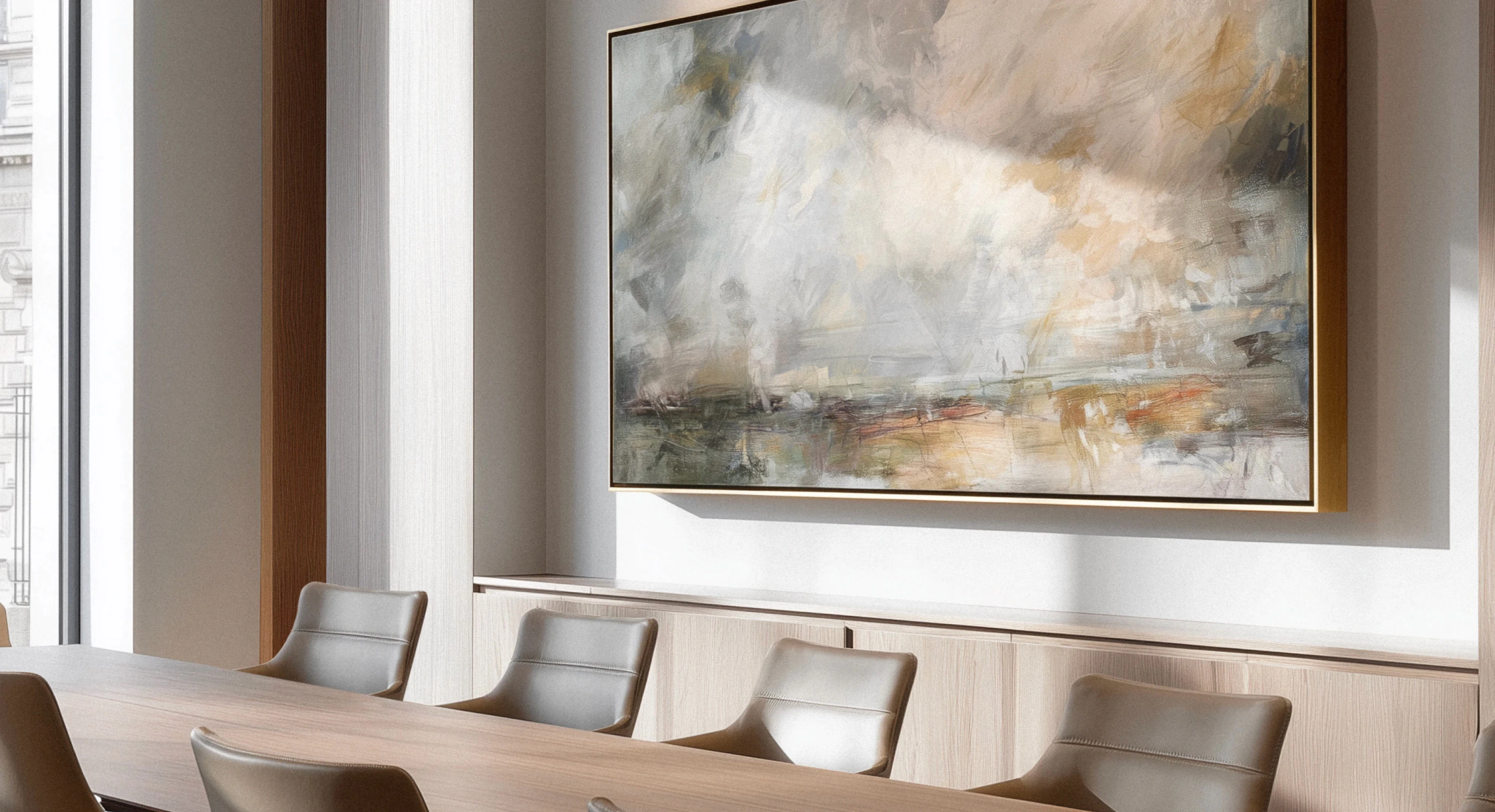 Interior imagery featured on Legora’s website showing a calm, modern meeting room with warm light and abstract artwork, reflecting the brand’s sophisticated and trustworthy identity