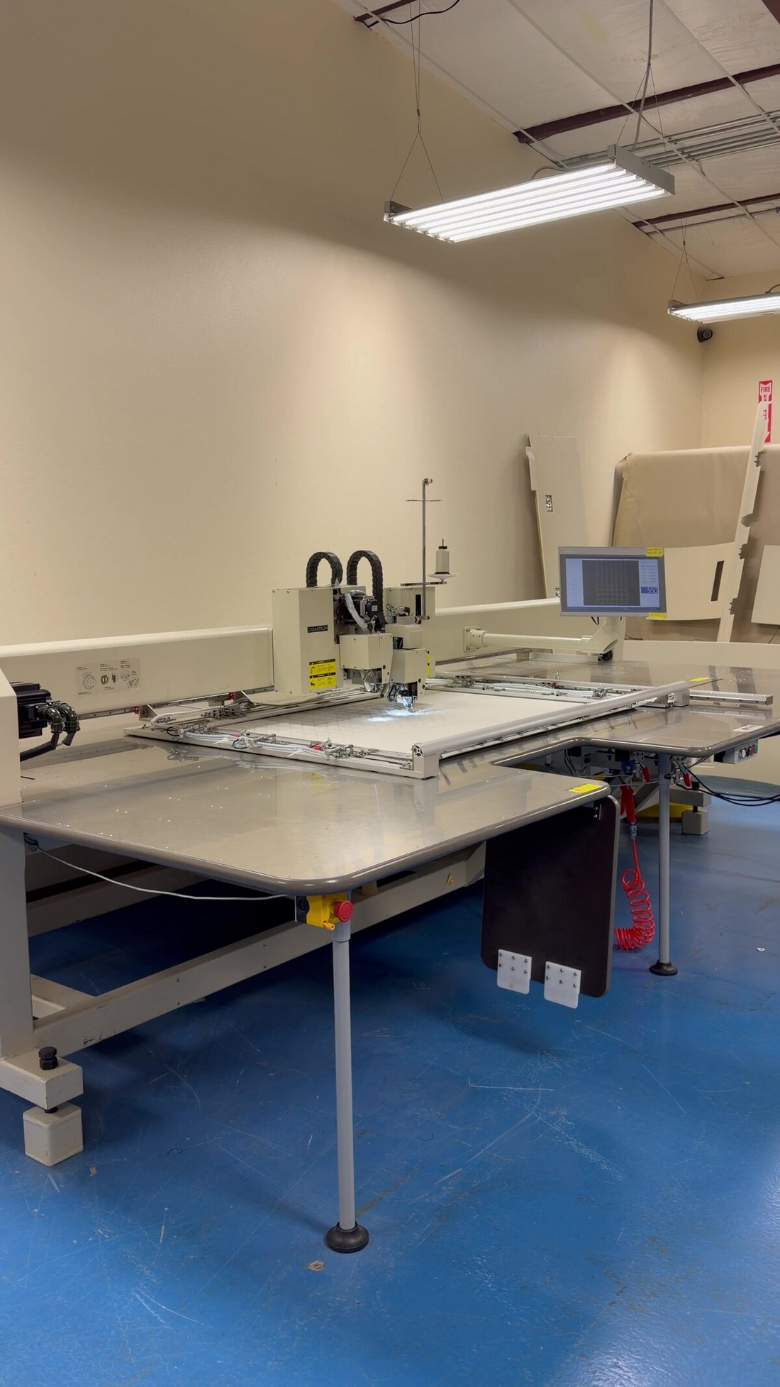 CNC pattern-sewing machine on the Avtec shop floor in Tyler, Texas