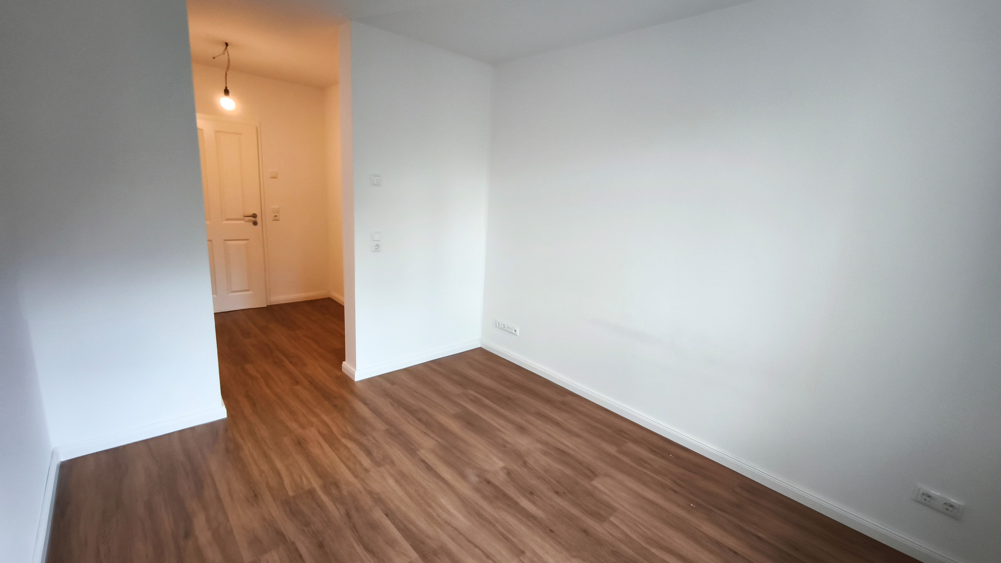 Schlafzimmer mit Ankleideraum