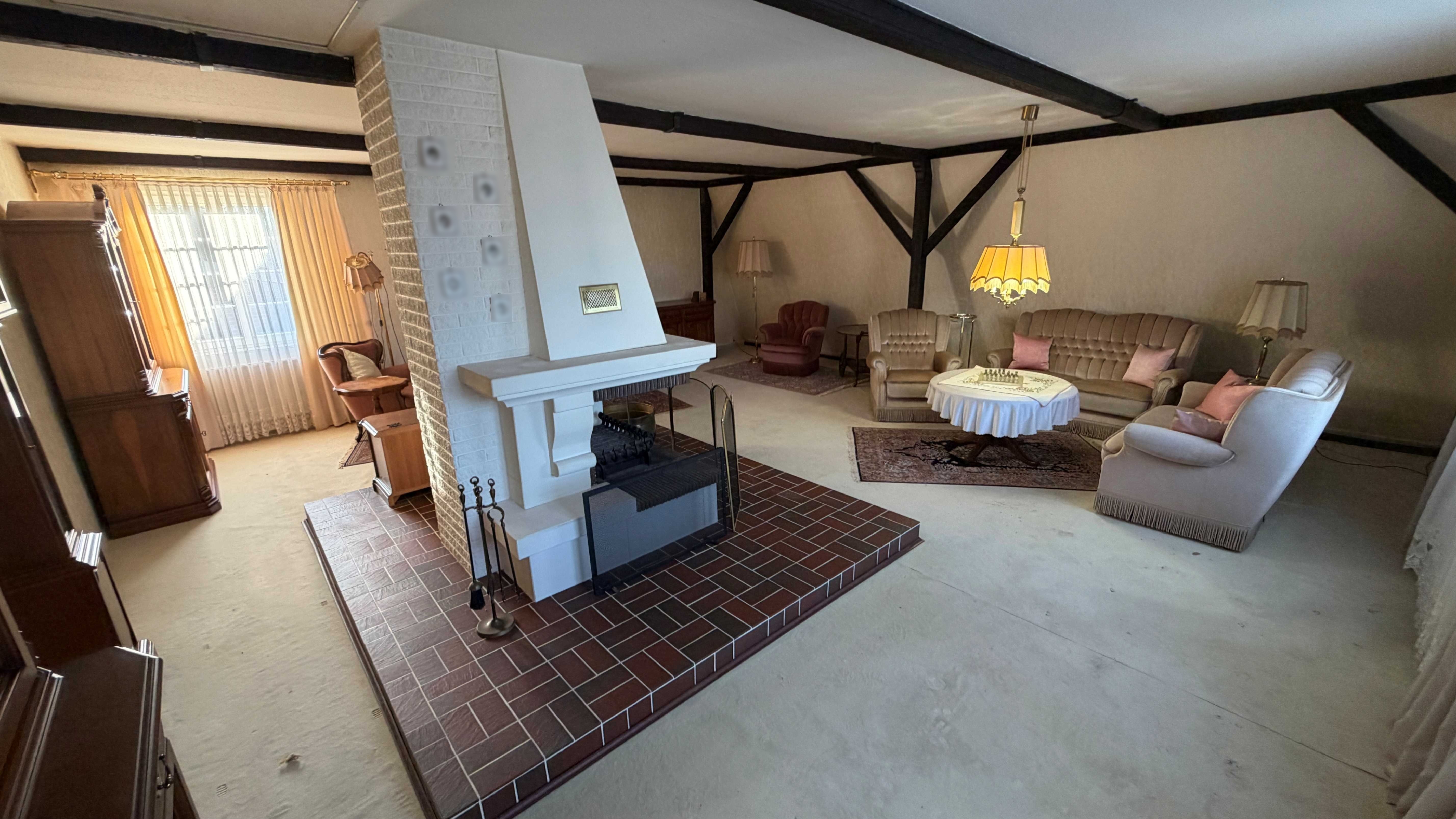 Wohnbereich mit offenem Kamin OG (3)