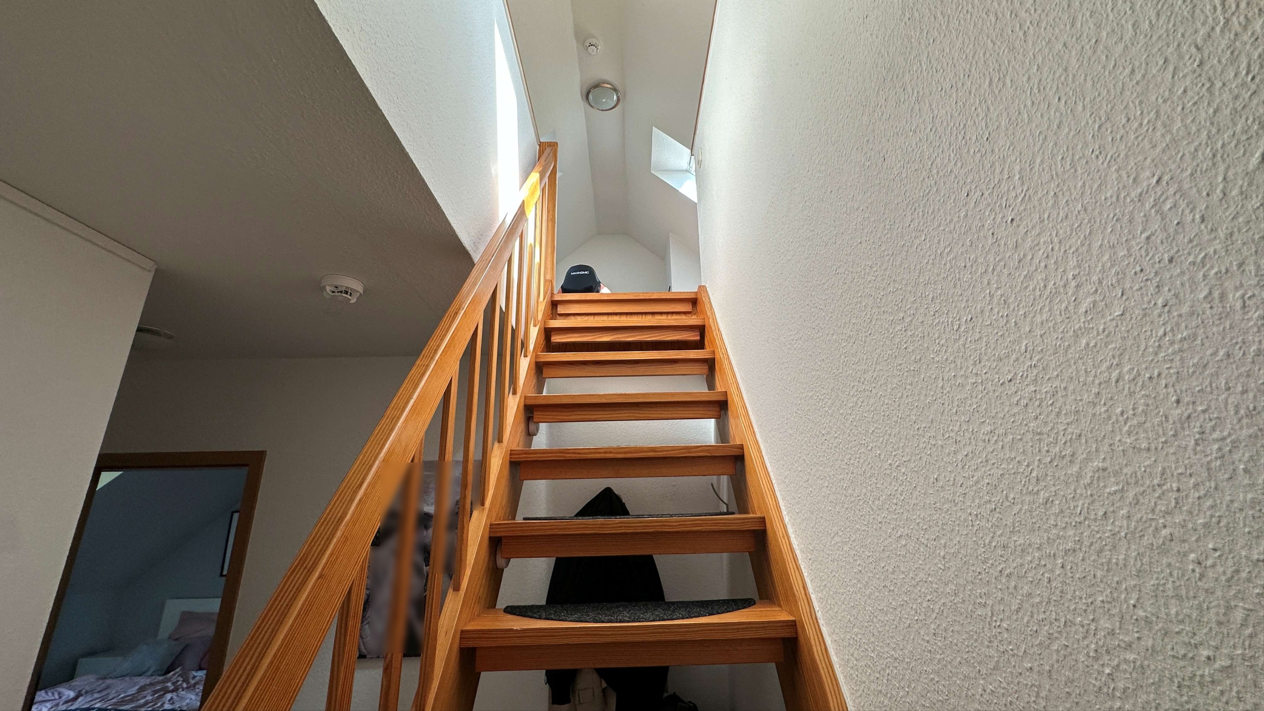 Treppe in den ausgebauten Spitzboden