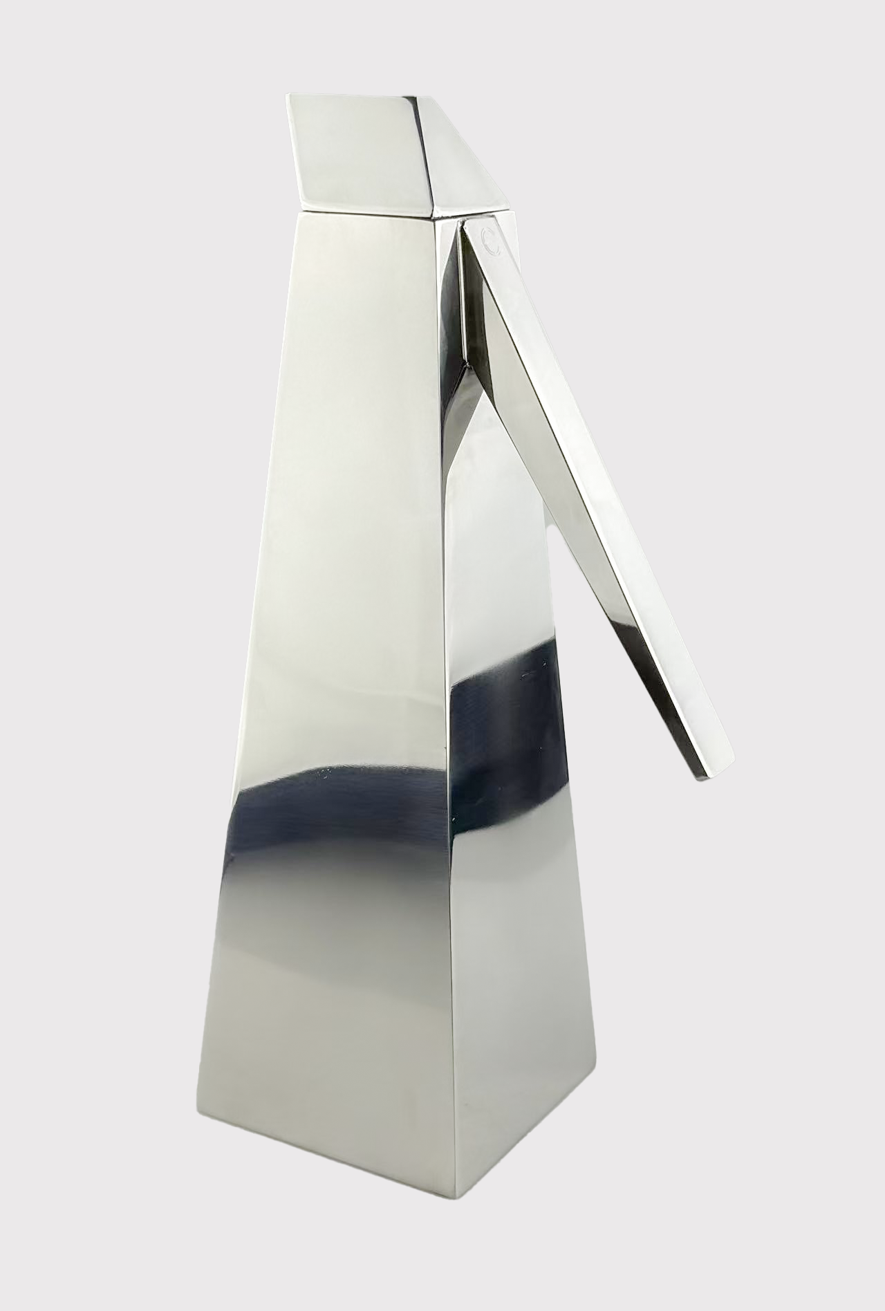 The Tekhen Water Pitcher takes inspiration from the narrow, tapered form of the Ancient Egyptian obelisk — sharp, elegant, and timeless. Crafted from polished 304 stainless steel, its sculptural design elevates the simple act of serving water into a statement. With a 1.5L capacity, the Tekhen is as functional as it is striking.