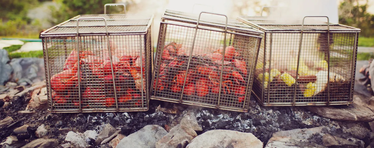 New England Clambake is a custom that dates back well before our forefathers landed on Plymouth Rock featuring seafood, corn, potatoes, and onions!