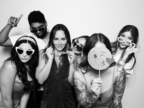 Black and white photo booth rental. Group photo for Palace Aesthetics Grand Opening in Portland.