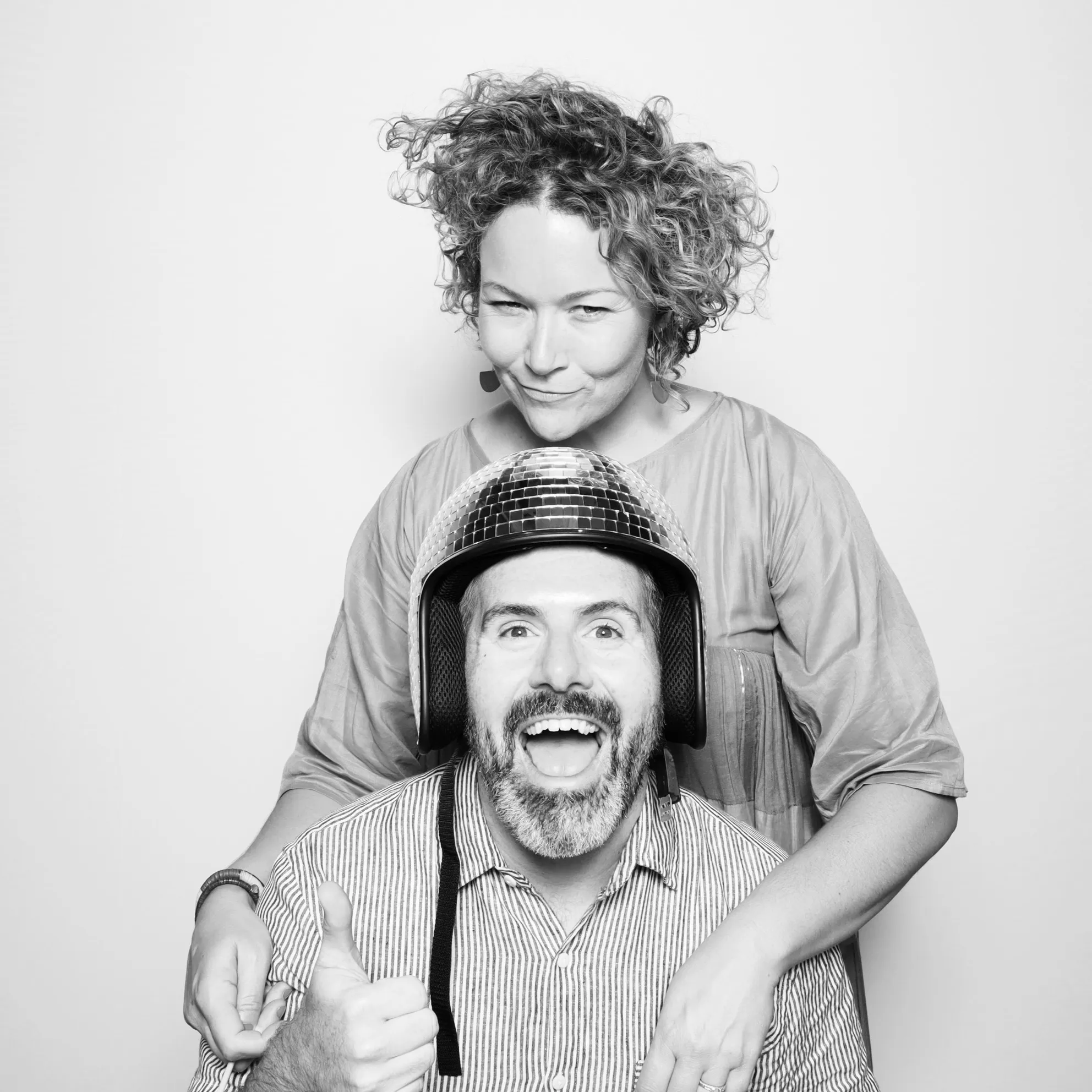 Black and white photo booth rental. Couple posing during Palace Aesthetics Grand Opening in Portland.