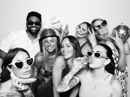 Black and white photo booth rental. Large group photo for Palace Aesthetics Grand Opening in Portland.