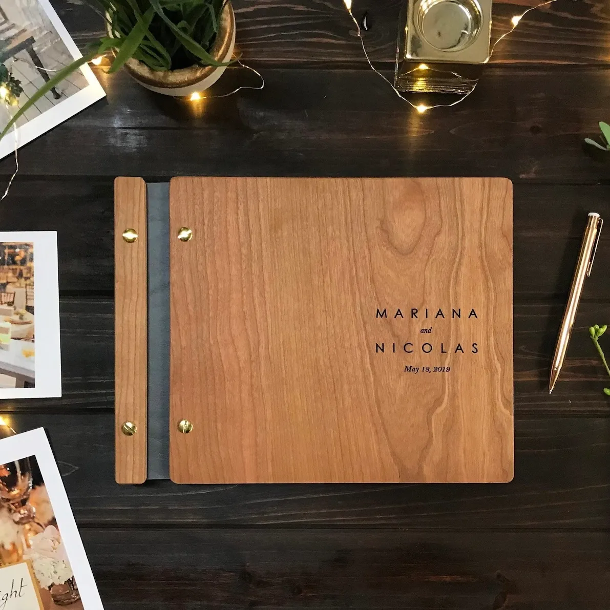 Custom engraved photo album with printed photo booth photos from Portland wedding