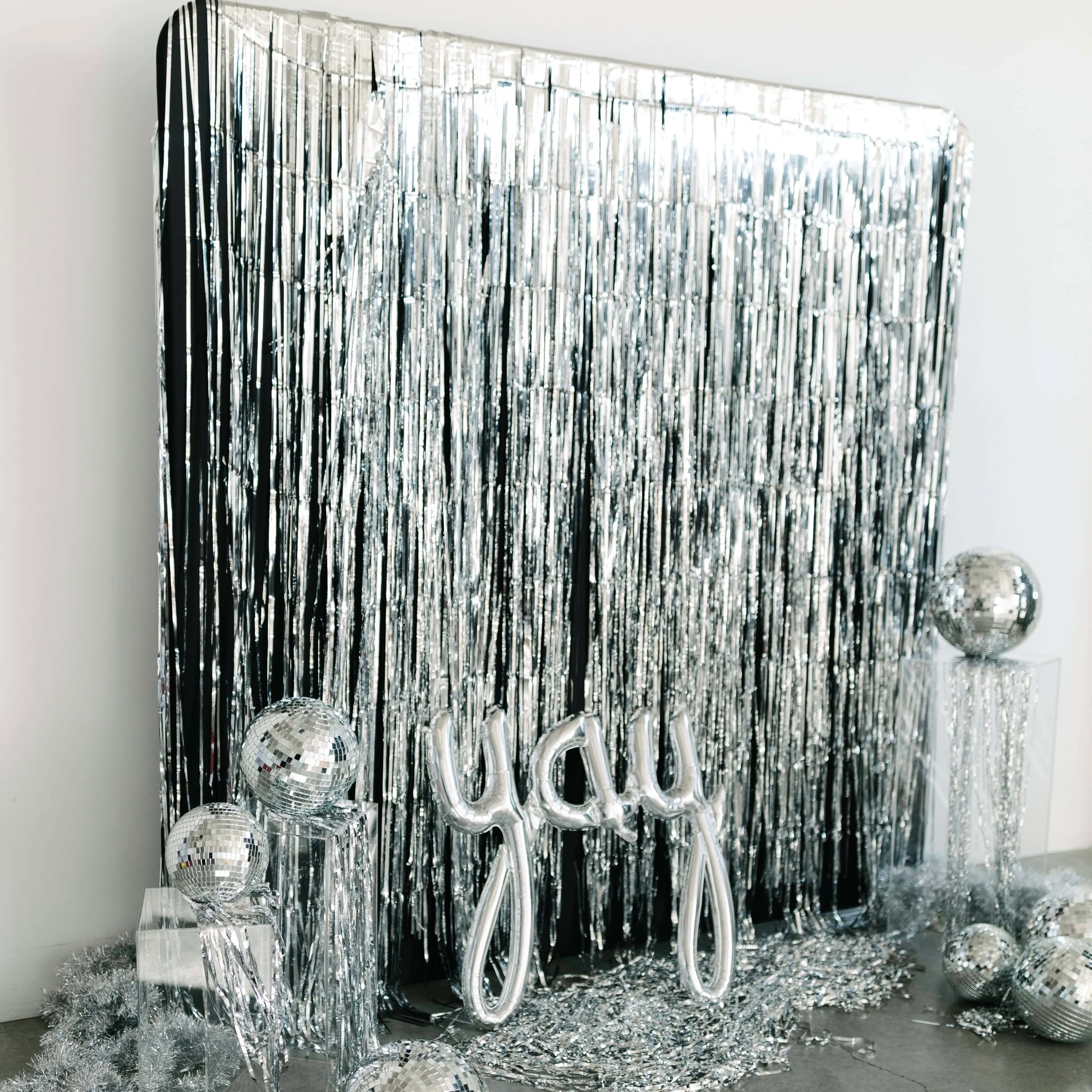 Custom backdrop with disco balls and metallic features