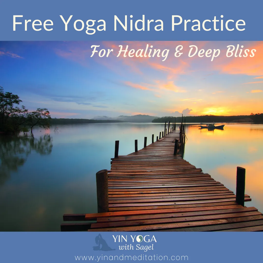 a calm lake with a windy plank bridge