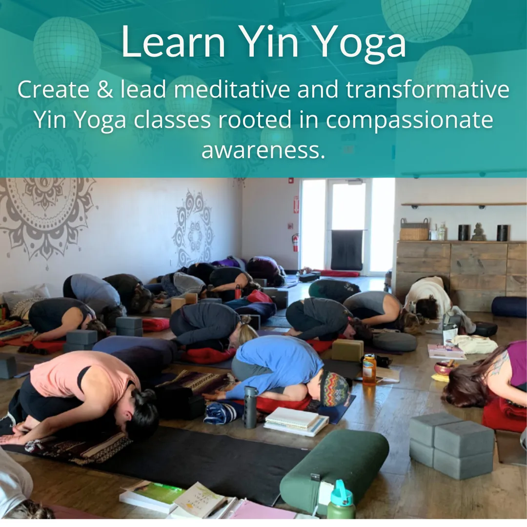 a class of yoga students in child's pose