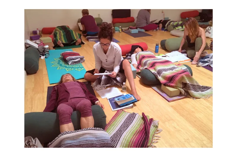 yoga nidra trainees teaching students yoga nidra