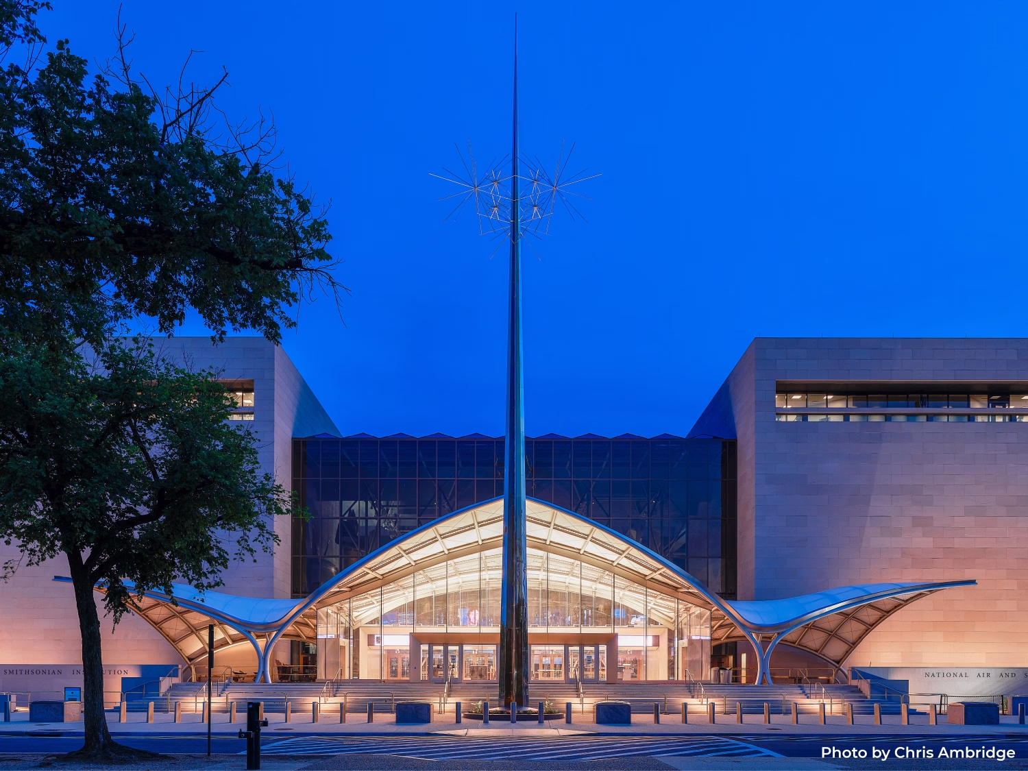 Exterior of the National Air and Space Museum in the evening.