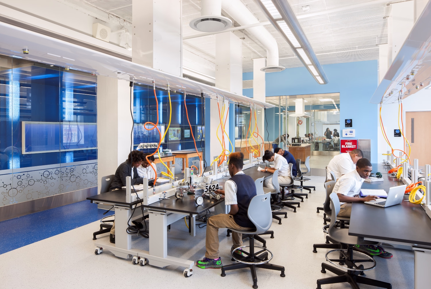 Students work inside their middle school science classroom.