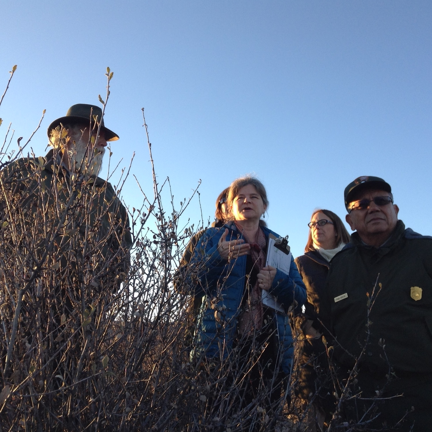 A team member communicates with our collaborators outside on site.