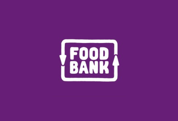 White Food Bank logo with arrows forming a rectangle around the words on a solid purple background.