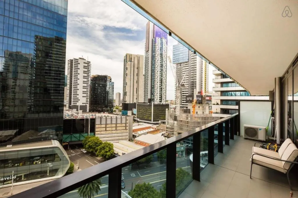 A modern balcony view overlooking the city skyline.