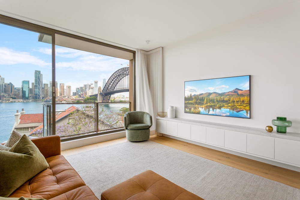 Kirribilli apartment living room with Sydney Harbour Bridge and city skyline views