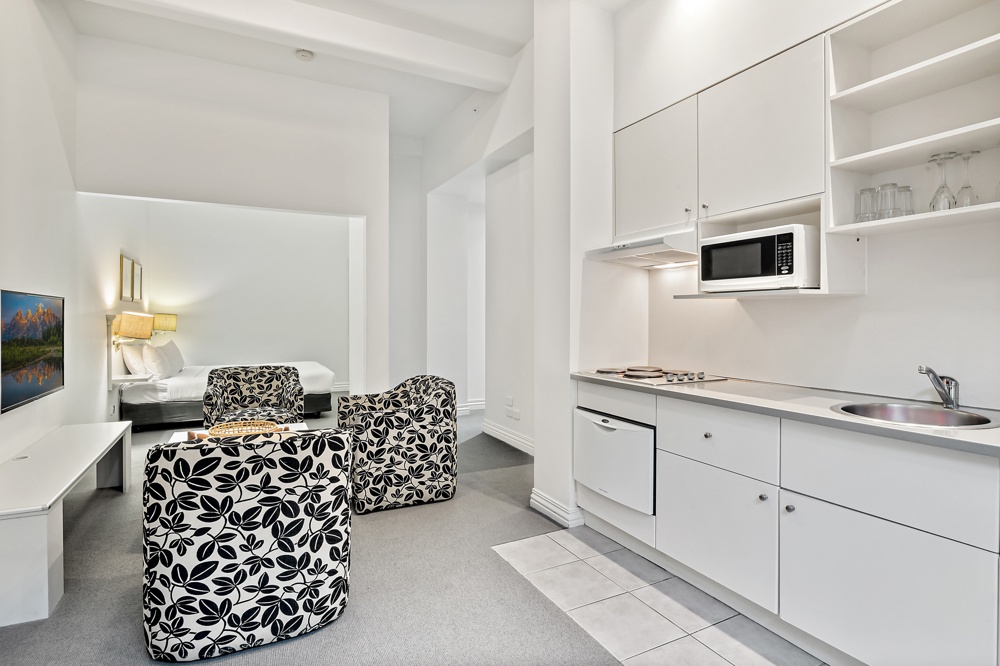 Kitchen, sitting area and sleeping space in a central Melbourne studio