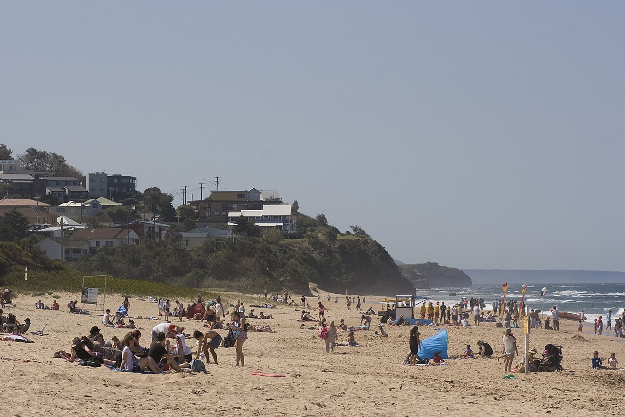 Visitors enjoying a sunny day at Thirroul Beach