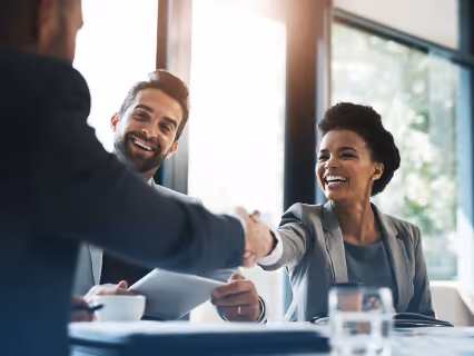 A shipday partner shaking hands with a representative