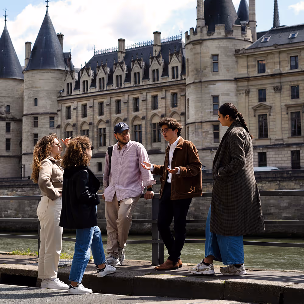 Group of people in front of medieval castle