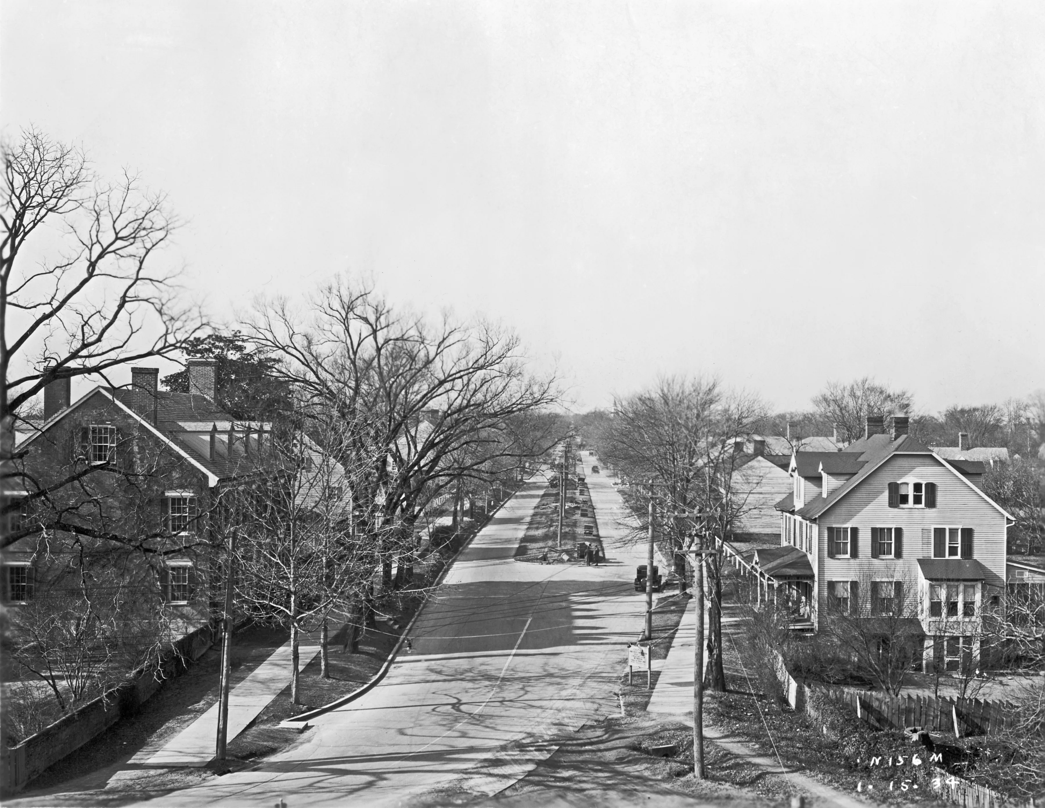 Black and white aerial view of Duke of Gloucester Street in Colonial Williamsburg, Virginia in 1934, with the Armistead House visible on the right