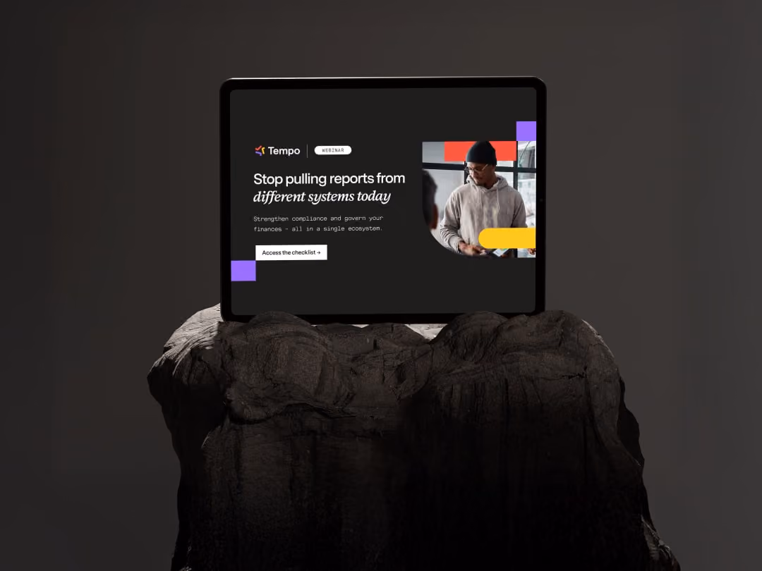 Tablet on dark rock showing Tempo webinar about stopping reports from different systems today.